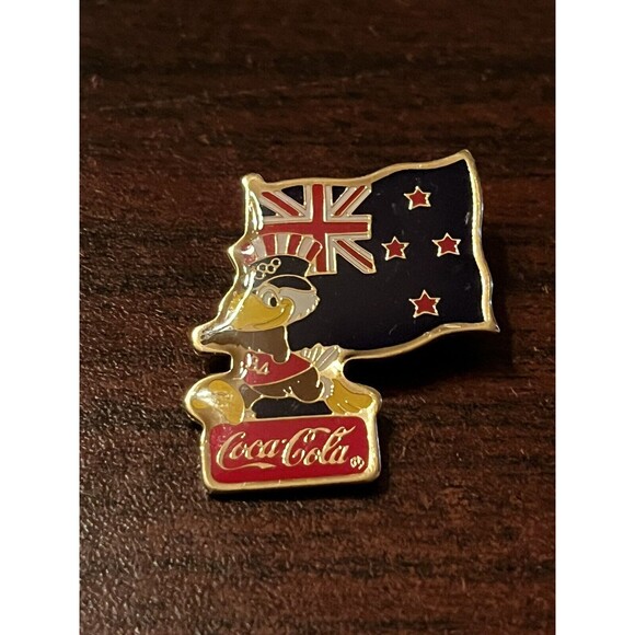 Vintage 1984 Los Angeles Olympics Coca Cola Sam Eagle New Zealand Flag Lapel Pin - Picture 1 of 3